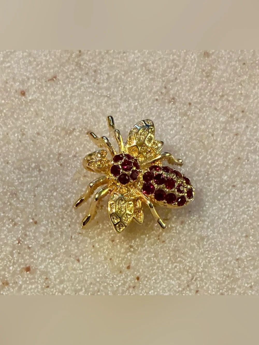 Gold Bee Brooch with Red Crystal Accents